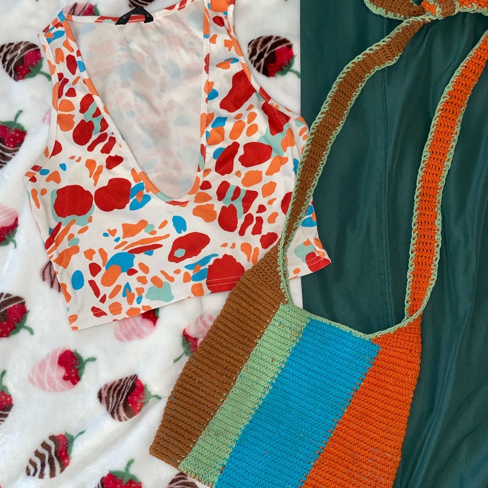 Colorful Patterned Crop Top and Striped Knit Bag